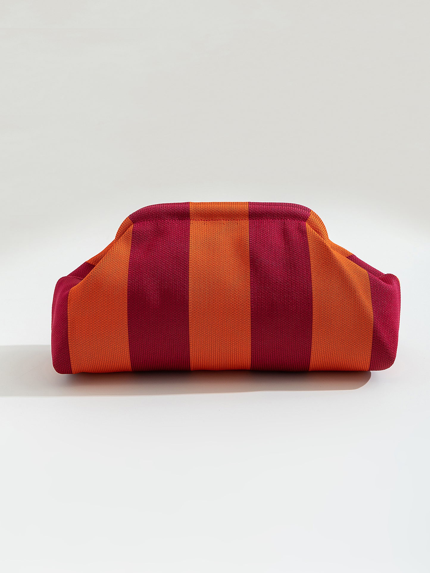 תיק קלאץ פסים