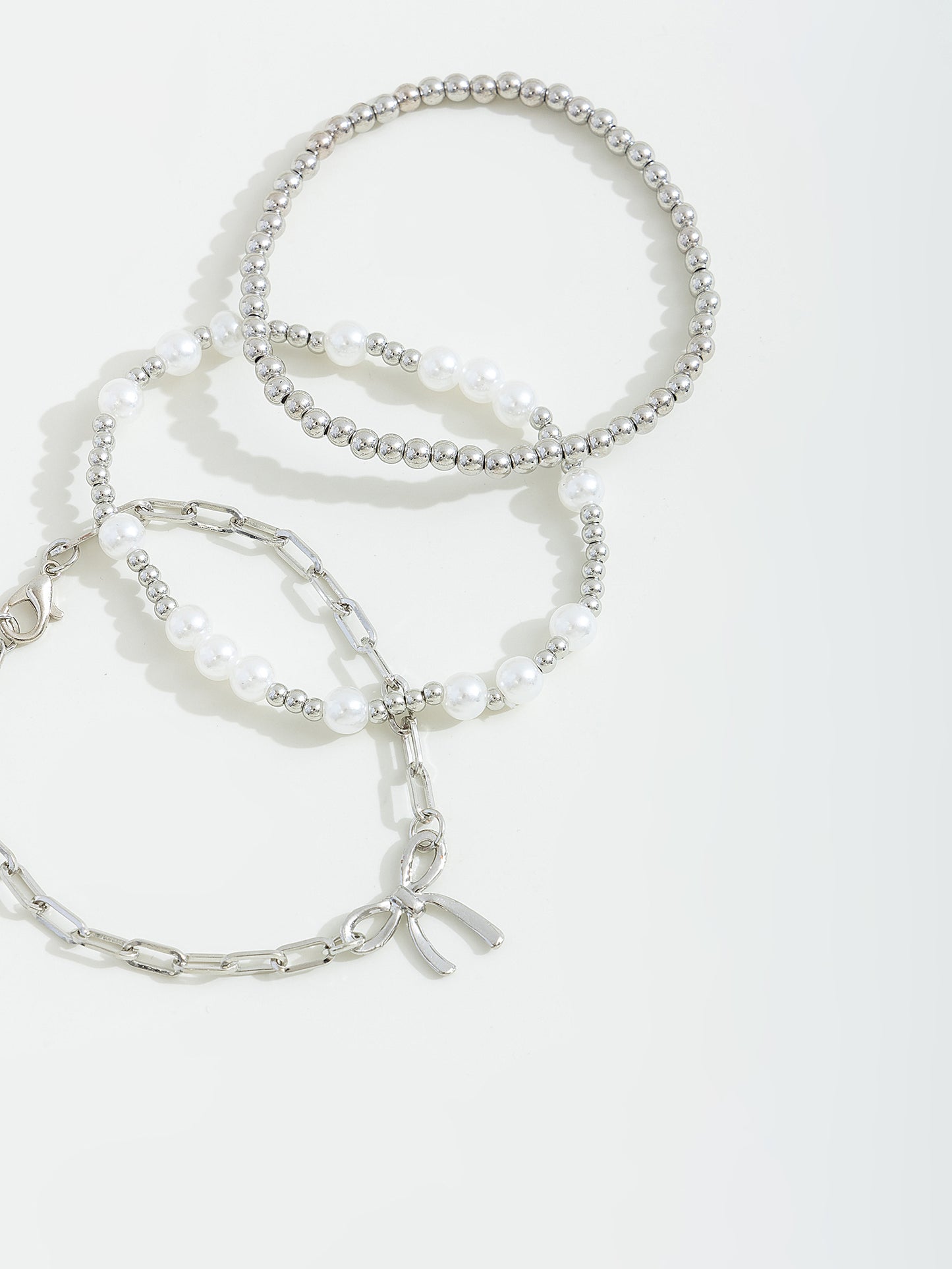 סט צמידים בשילוב פפיון