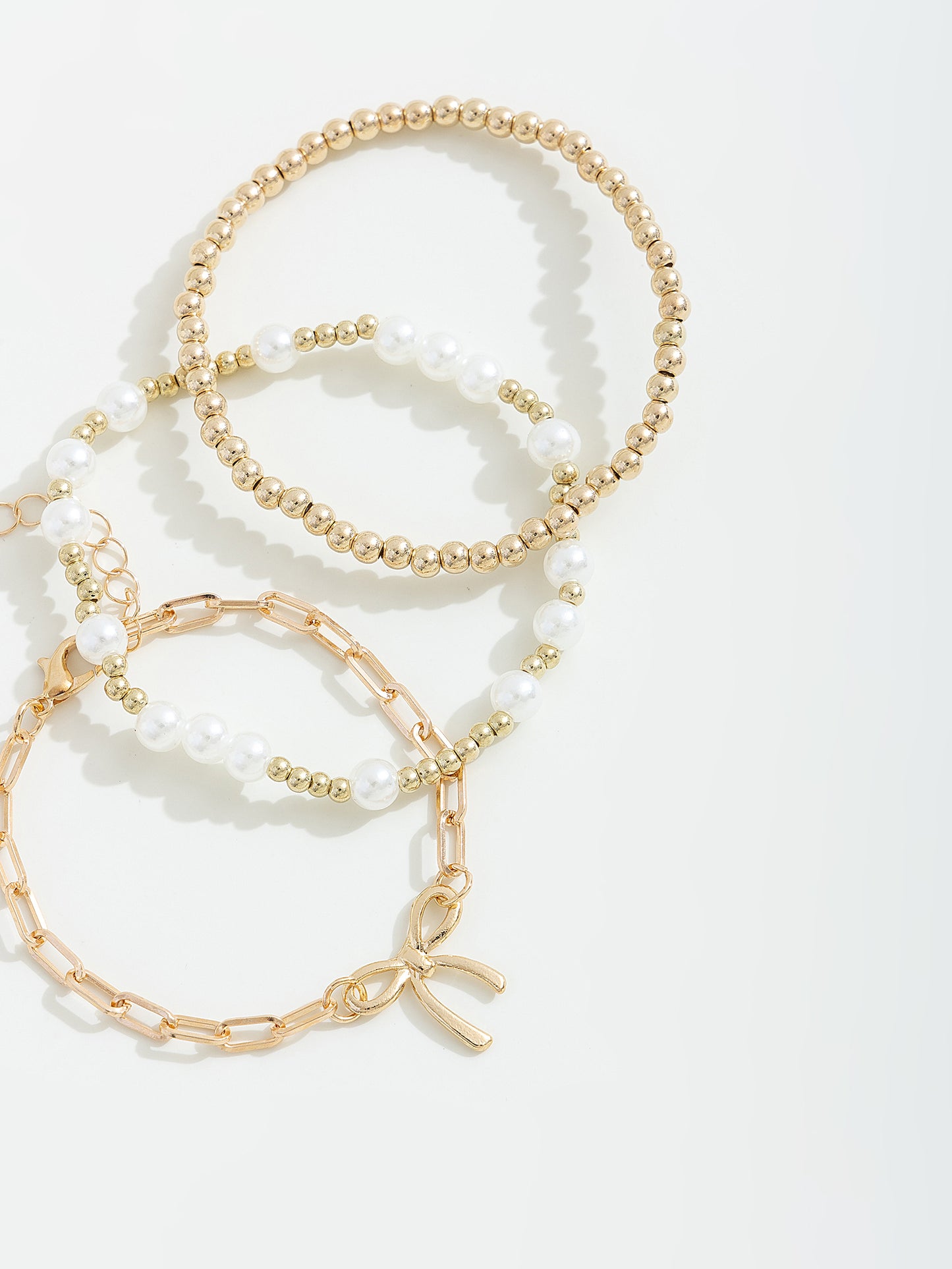 סט צמידים בשילוב פפיון